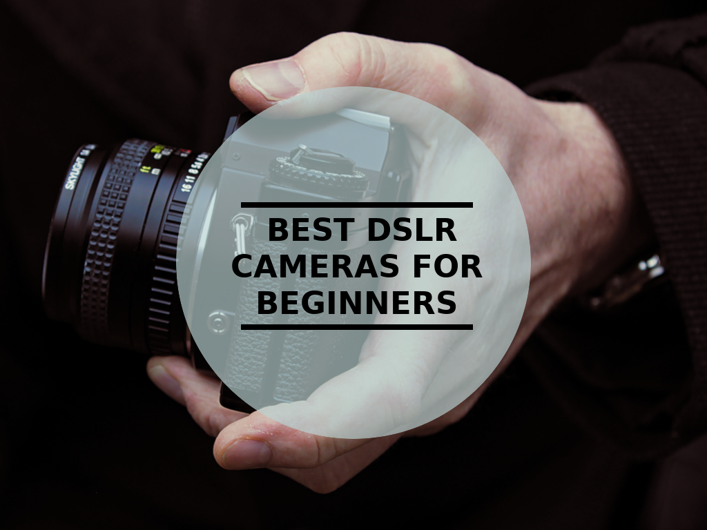 Man Holding a DSLR Camera