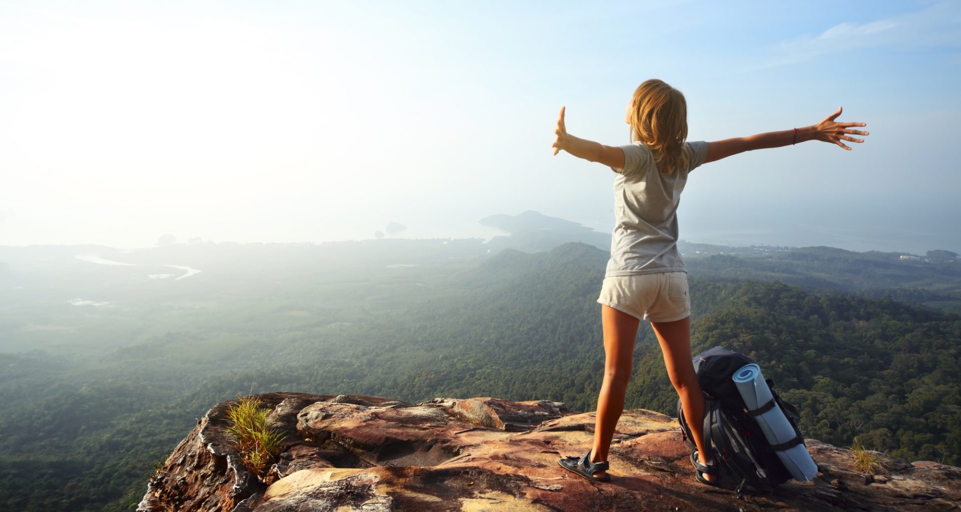 Young woman enjoying a hike.